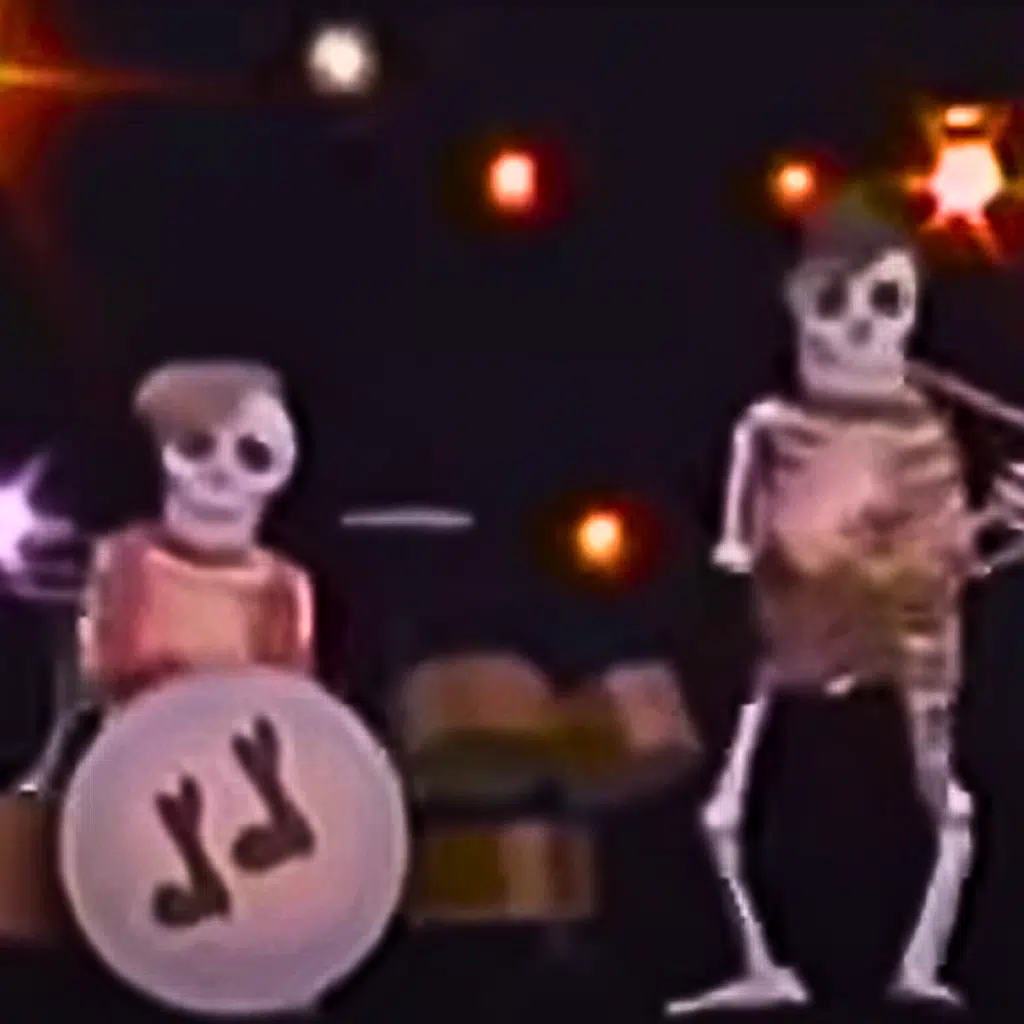 Les deux marionnettes des squelettes jouent de la musique.