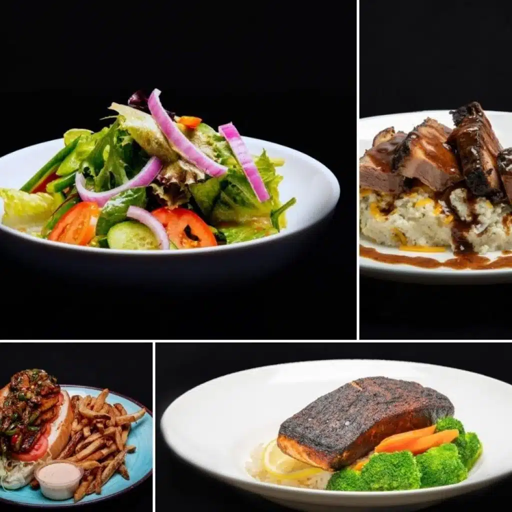 Quatre plats devant un arrière-plan noir : Une salade composée; de la viande sur du riz; un sandwich avec des frites; et un filet de saumon avec du riz, des légumes et une tranche de citron.